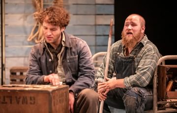 Ben Wilson p[laying Candy sits behind Liam King playing George.