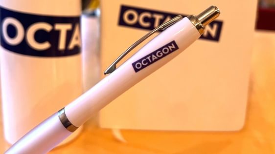 white pen with octagon purple logo