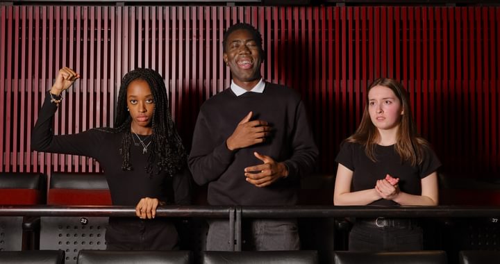 Image of three youth performers posing