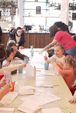 Children and parents doing arts and crafts