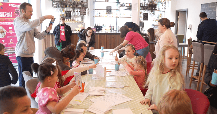 Children and parents doing arts and crafts