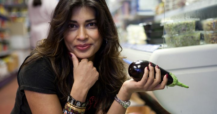 Nisha Katona holding an aubergine
