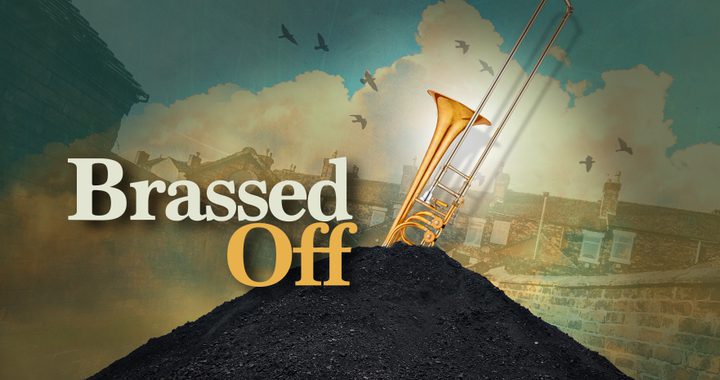 Brassed off title treatment with a trombone in a pile of coal behind it.