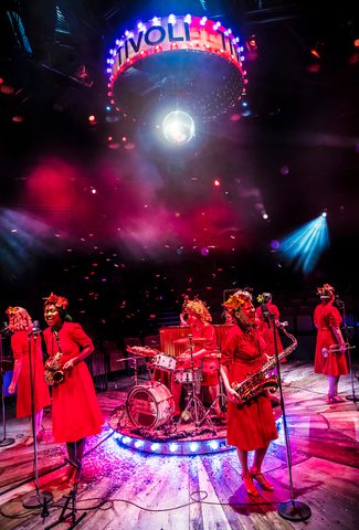 Group of performers playing instruments