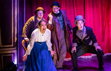 4 actors in victorian dress looking scared