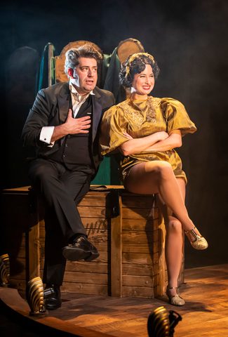 Man and woman sitting crossed legged