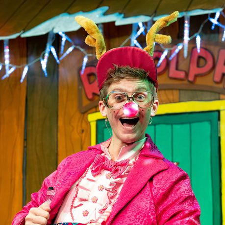 A man dressed up as Rudolph the reindeer