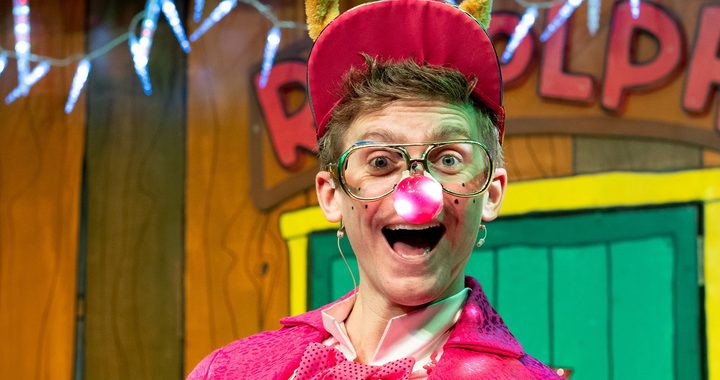 A man dressed up as Rudolph the reindeer