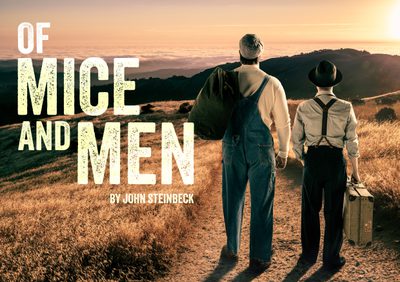 2 men standing looking into the sunset on the plains of USA