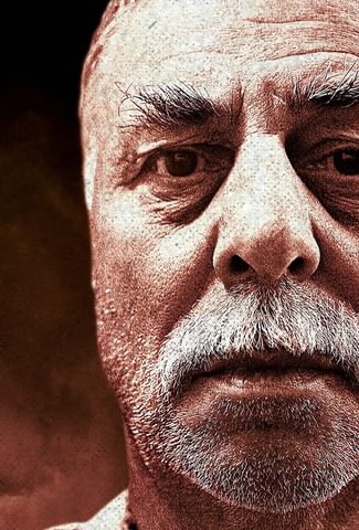 Close up of face of man with a white beard