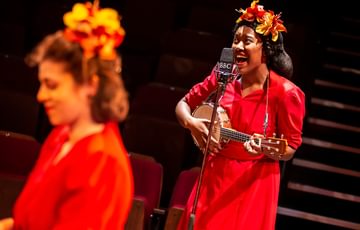 woman playing ukulele