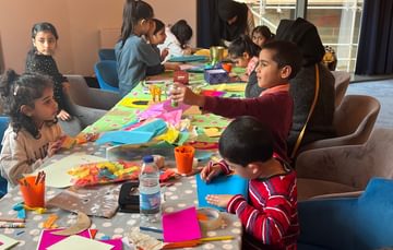 Image of children taking part in arts and crafts session